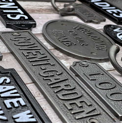 Wall plaque sign - wall,